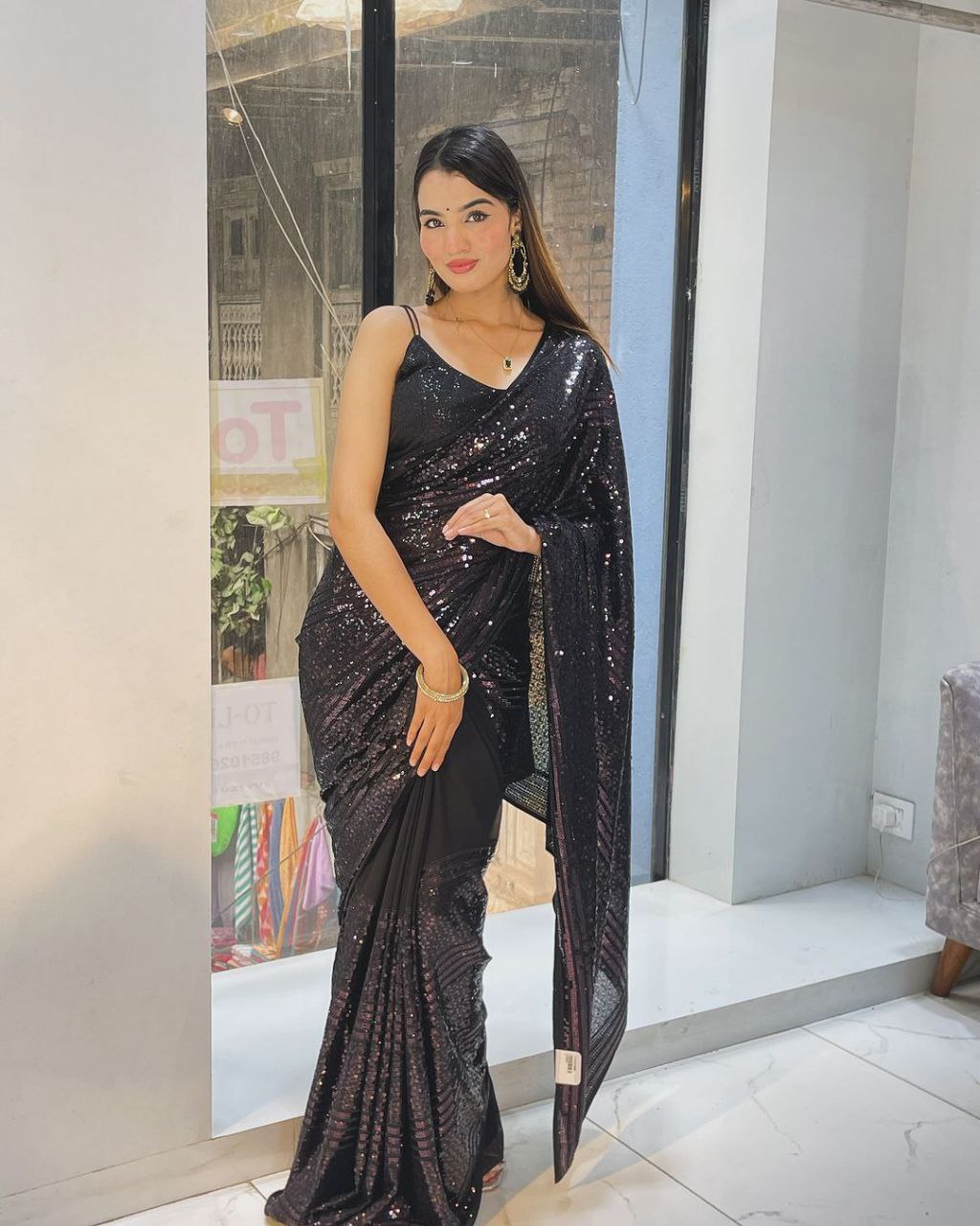 Devastating Party Wear Black Color Sequence Embroidery Work Designer Georgette Saree